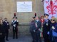 La lapide in Piazza Stazione sulla facciata ex Scuola in ricordo dei 700 Carabinieri Angeli del Fango